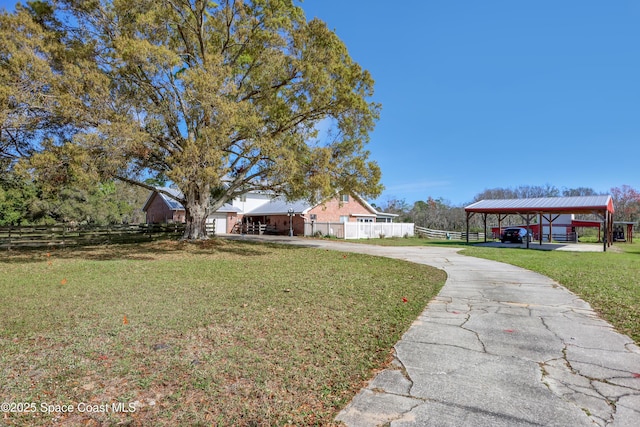 view of yard with a carport