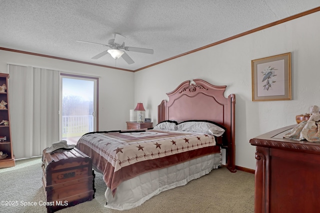 bedroom with ceiling fan, light colored carpet, ornamental molding, and a textured ceiling