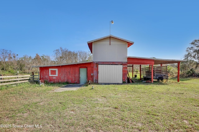 view of outdoor structure with a yard