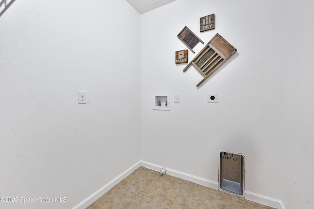 clothes washing area featuring laundry area, washer hookup, electric dryer hookup, and baseboards