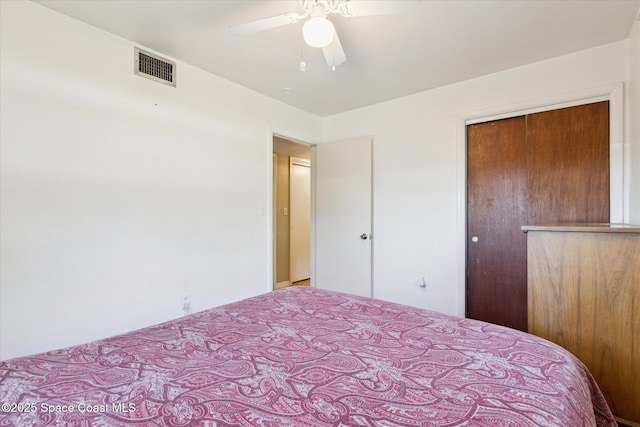 unfurnished bedroom featuring ceiling fan and visible vents