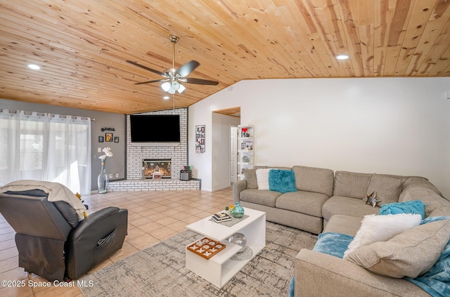 living room with light tile patterned flooring, lofted ceiling, wood ceiling, and a brick fireplace