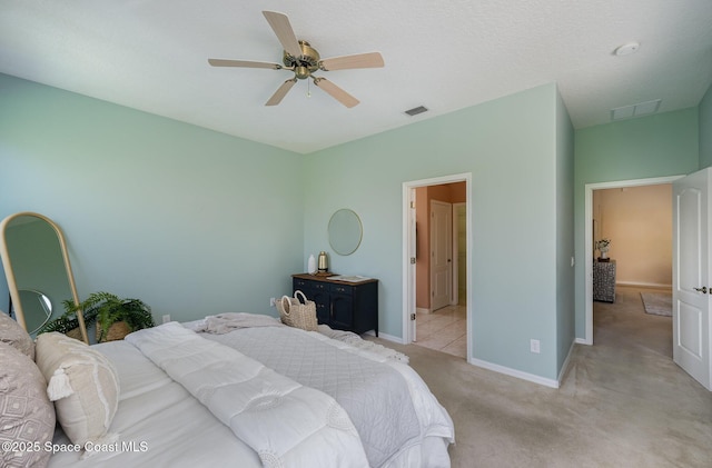 bedroom with light colored carpet and ceiling fan