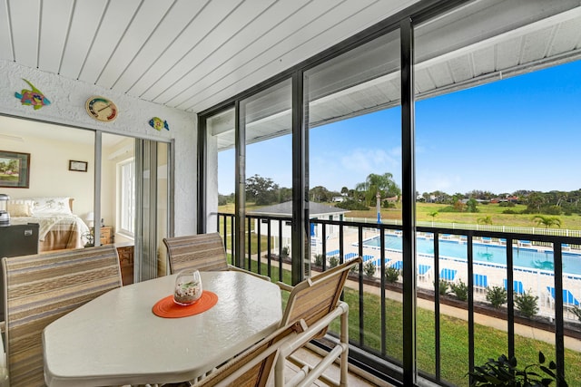 sunroom featuring plenty of natural light