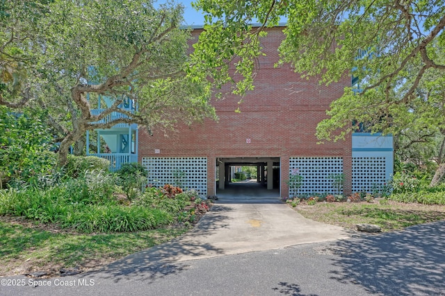 view of front of home with a carport