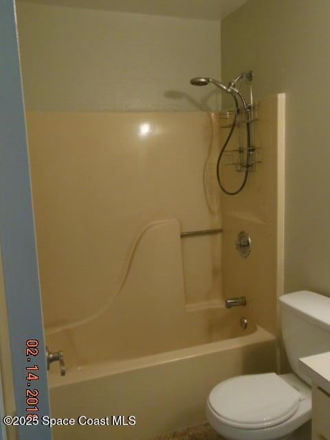 full bathroom with vanity, shower / bathtub combination, and toilet