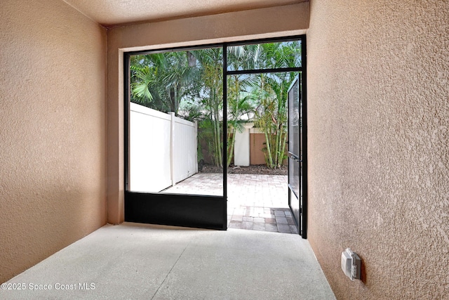 1425 Lara Cir Unit 103, Rockledge, FL 32955 - doorway featuring a textured wall