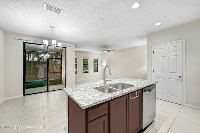 1425 Lara Cir Unit 103, Rockledge, FL 32955 - kitchen featuring dishwasher, light tile patterned floors, a chandelier, decorative light fixtures, and light stone countertops