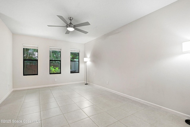 1425 Lara Cir Unit 103, Rockledge, FL 32955 - empty room featuring a ceiling fan and light tile patterned floors