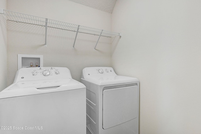 1425 Lara Cir Unit 103, Rockledge, FL 32955 - washroom featuring separate washer and dryer