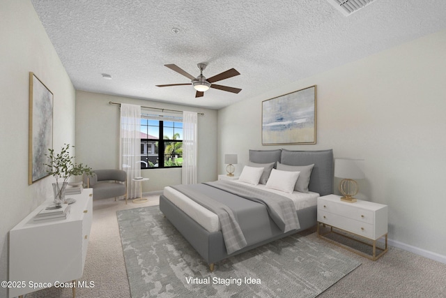 1425 Lara Cir Unit 103, Rockledge, FL 32955 - bedroom with carpet floors, a textured ceiling, and ceiling fan
