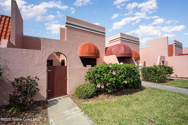 view of front of house with stucco siding