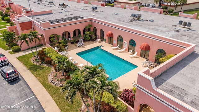 community pool featuring a patio