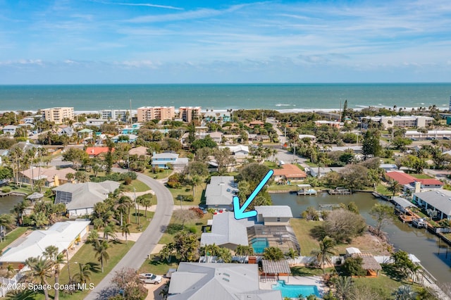 drone / aerial view featuring a water view