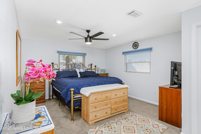 bedroom with recessed lighting, visible vents, light carpet, ceiling fan, and baseboards