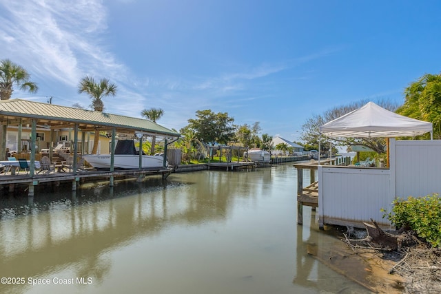 dock area featuring a water view and boat lift