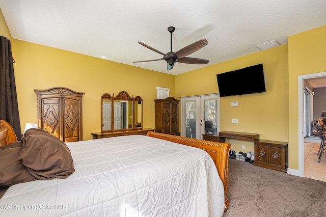 bedroom with ceiling fan, light carpet, and access to outside