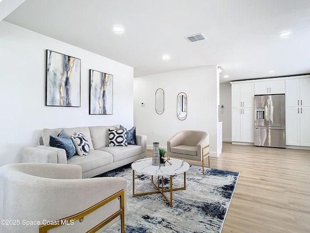 living room featuring light hardwood / wood-style flooring