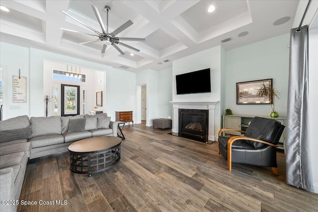 living room featuring ceiling fan, coffered ceiling, wood-type flooring, and beam ceiling
