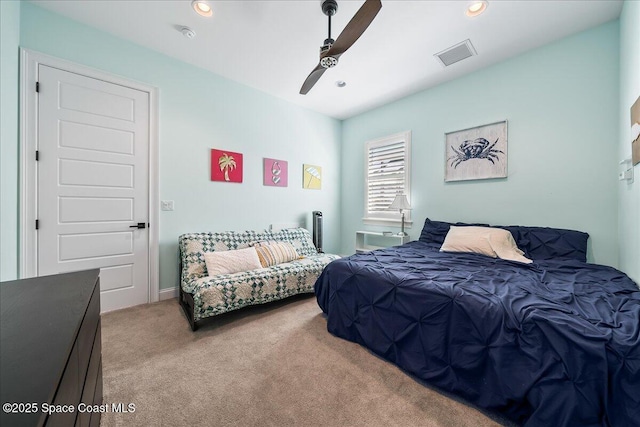 carpeted bedroom featuring ceiling fan
