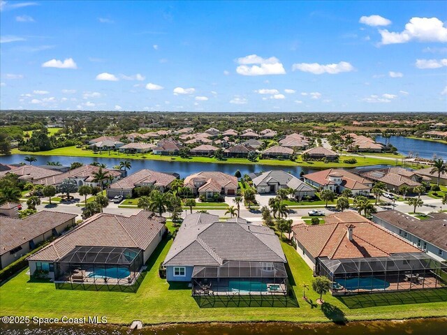 bird's eye view with a water view