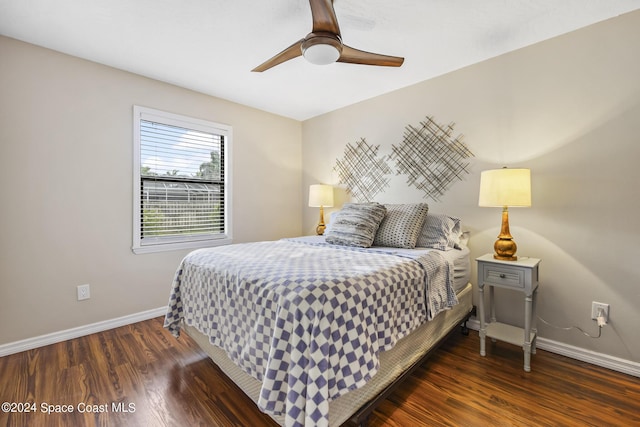 bedroom featuring dark wood-type flooring and ceiling fan