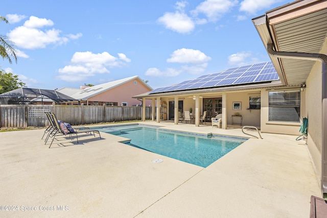 view of pool with a patio area