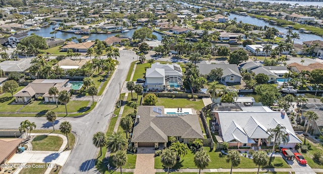 aerial view featuring a water view