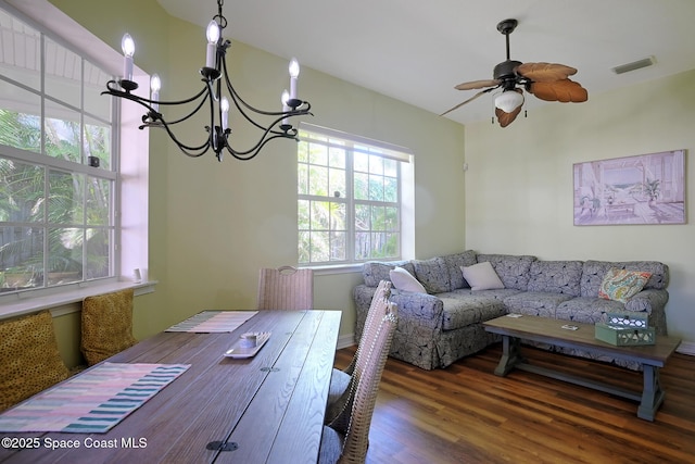 7831 Winona Rd, Melbourne Beach, FL 32951 - office space featuring a chandelier, wood finished floors, and a ceiling fan