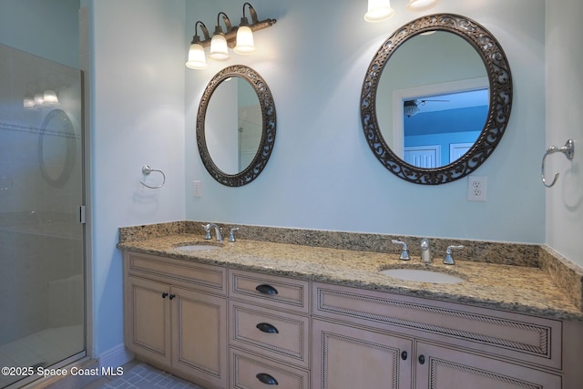 7831 Winona Rd, Melbourne Beach, FL 32951 - full bath with double vanity and a stall shower
