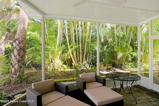 7831 Winona Rd, Melbourne Beach, FL 32951 - sunroom featuring a ceiling fan and outdoor dining area