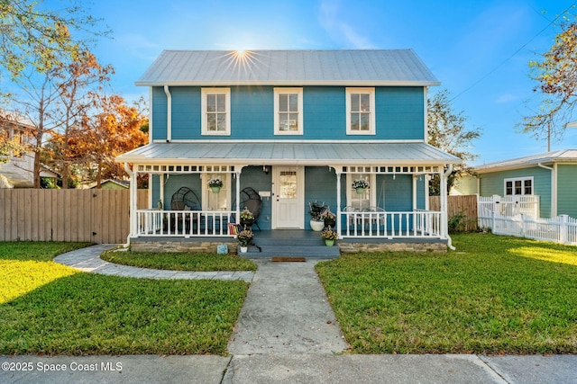 view of front of home featuring a porch and a front yard