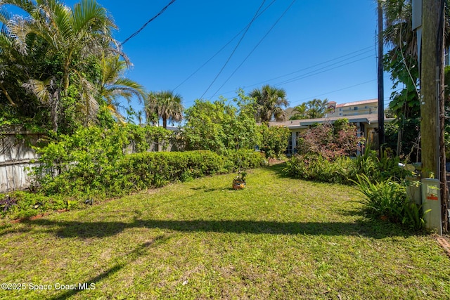 view of yard with fence