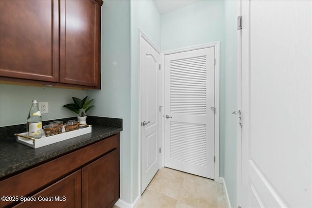 interior space featuring light tile patterned flooring