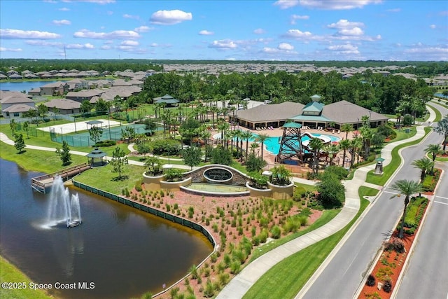 bird's eye view with a water view