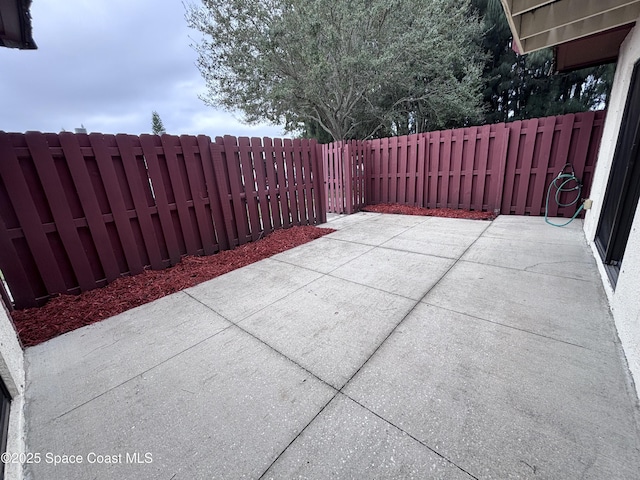 view of patio with a fenced backyard