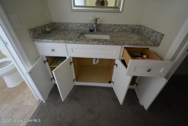 bathroom featuring a sink and toilet