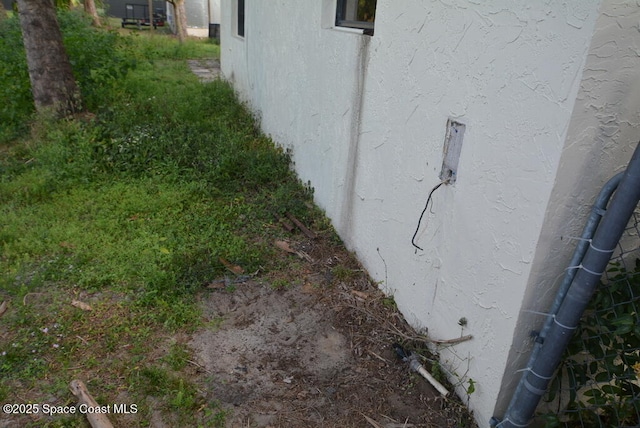 exterior details with stucco siding