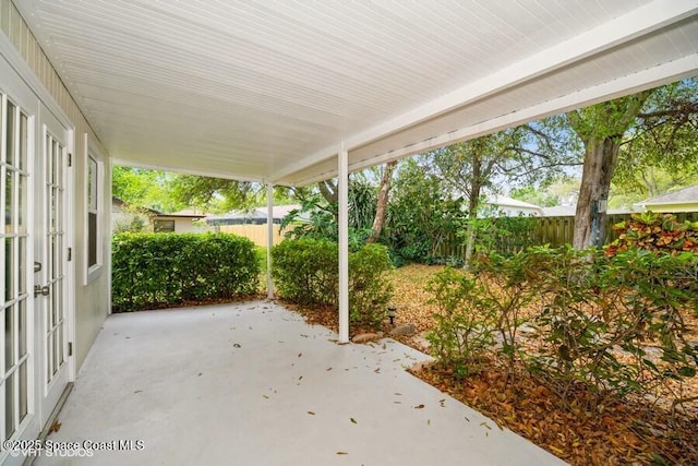 view of patio / terrace featuring fence