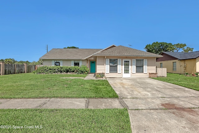 ranch-style house featuring a front yard