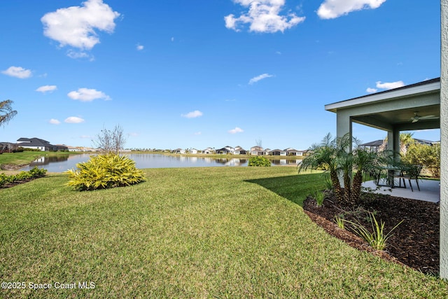 2496 Kamin Dr S, Melbourne, FL 32940 - view of yard with ceiling fan and a water view