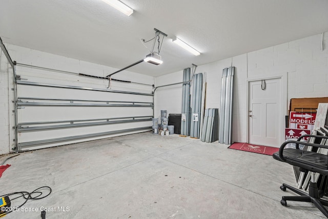 2496 Kamin Dr S, Melbourne, FL 32940 - garage with a garage door opener