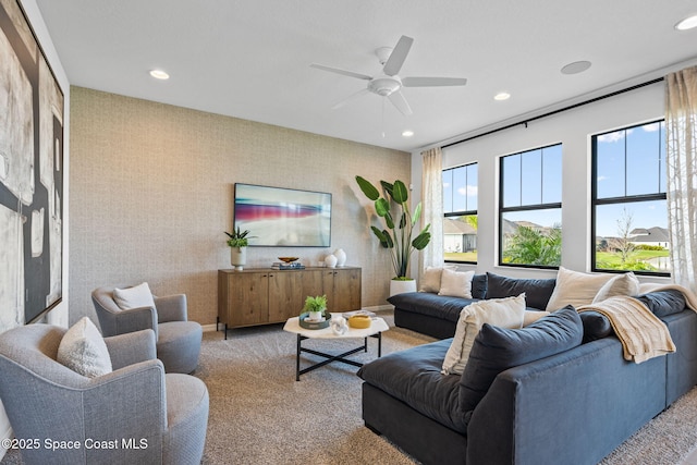 2496 Kamin Dr S, Melbourne, FL 32940 - living room with carpet floors and ceiling fan