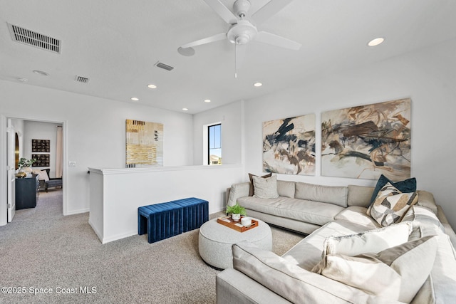 2496 Kamin Dr S, Melbourne, FL 32940 - living room featuring light colored carpet and ceiling fan