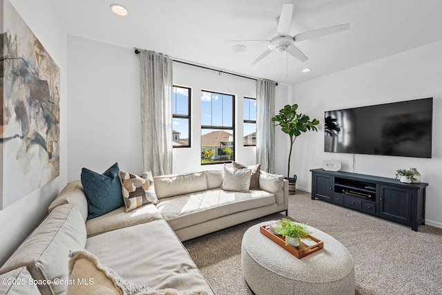 2496 Kamin Dr S, Melbourne, FL 32940 - living room featuring light colored carpet and ceiling fan