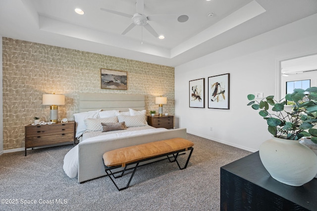 2496 Kamin Dr S, Melbourne, FL 32940 - carpeted bedroom featuring a raised ceiling and ceiling fan