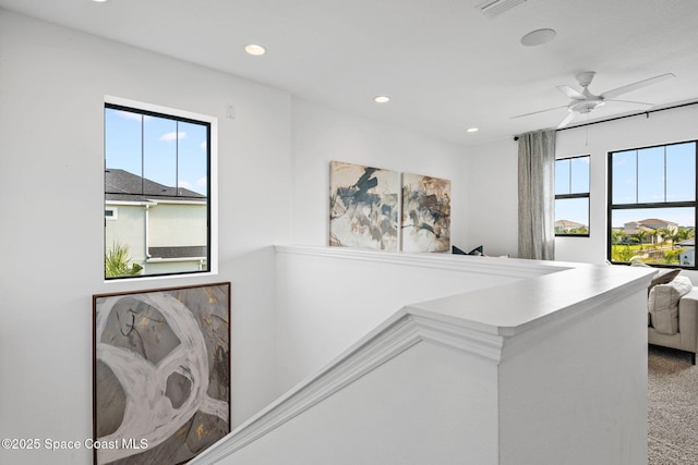 2496 Kamin Dr S, Melbourne, FL 32940 - hallway featuring carpet flooring