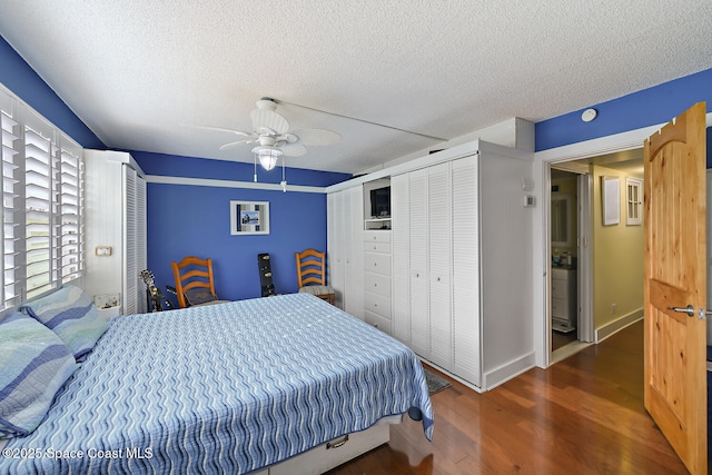 2355 Ocean Blvd Unit 11A, Stuart, FL 34996 - bedroom with ceiling fan, dark hardwood / wood-style floors, and a textured ceiling