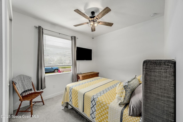 bedroom featuring carpet, ceiling fan, and baseboards