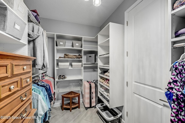 spacious closet with light floors